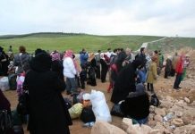 Familias con niños se encuentran entre quienes han sido bloqueados para cruzar a Jordania © Jordania Pix / Getty Images