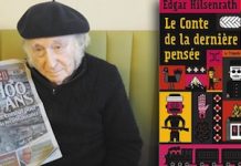 Edgar Hilsenrath junto a un periódico que recuerda el Centenario del Genocidio Armenio y la edición de su obra en francés que aborda el tema.