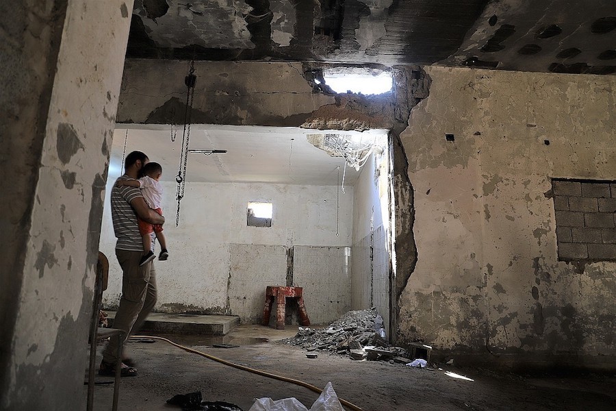 Amnistia-Internacional-casa-destrozada-en-Tripoli Libia: fuego cruzado de las milicias atrapa a la población civil en Trípoli
