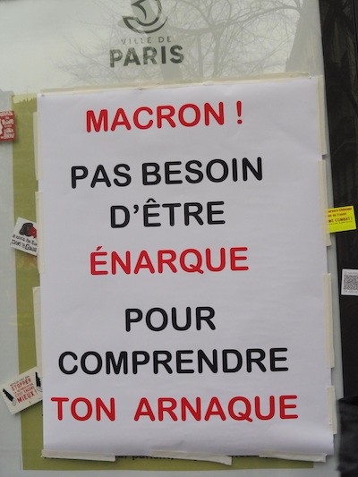 Paris-cartel-Macron-enarque Francia: 42 días de huelga contra el proyecto Macron