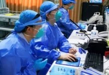 Man Yi: Enfermeras de la unidad de emergencias de un hospital de Shenzhen en China llevan mascarilla para protegerse del coronavirus