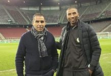 El presidente de la Federación de Argelia de Fútbol (FAF), Kheiriddine Zetchi, izquierda, junto al marroquí Abdeslam Ouaddou