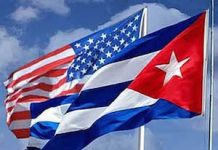 Banderas de Cuba y EEUU. Foto: rreloj.wordpress.com